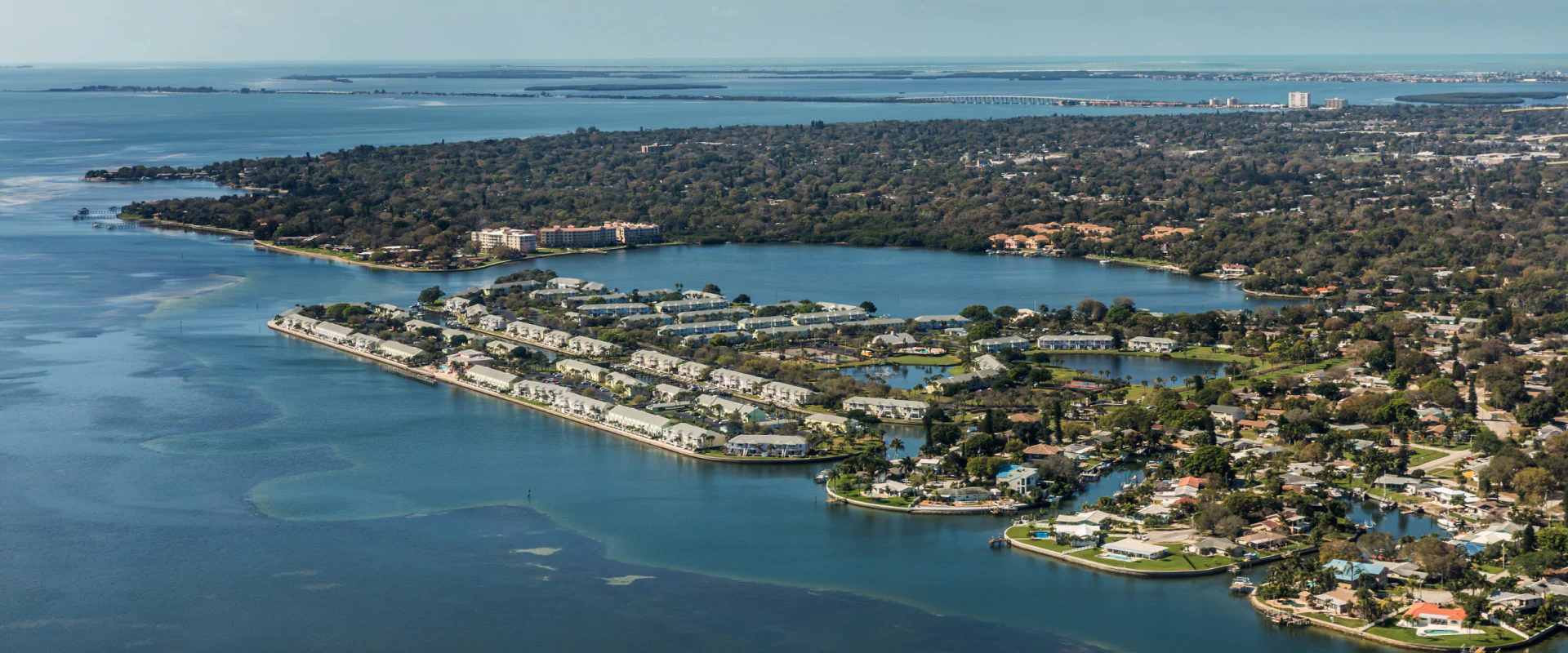 aerial view of city and gulf of marina village and resort cape coral fl